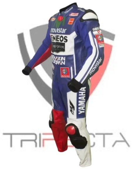 A motorcycle racing suit standing against a white background. The suit is predominantly blue with white and red accents, featuring several logos from sponsors such as ‘Movistar,’ ‘Yamaha,’ ‘Semakin Di Depan,’ and ‘Bridgestone.’ The design of the suit suggests it is meant for professional racing, given the placement of sponsor logos and protective elements typical of high-speed motorcycle racing gear