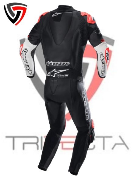 The suit features branding logos, including ‘Alpinestars’, ‘GP Pro’, and a graphic of a skeleton hand on the arms. The design suggests aerodynamics and protection for high-speed motorsport activities.